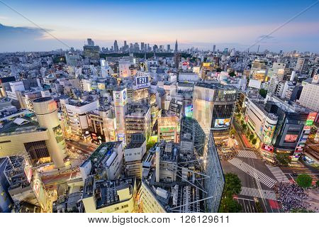 TOKYO, JAPAN - AUGUST 4, 2015: The Shibuya skyline at twilight. Shibuya is considered Tokyo's center for youth fashion and culture.