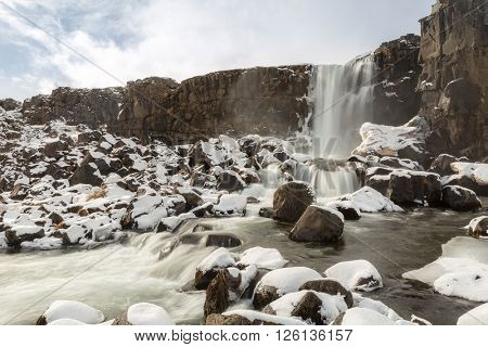 Oxararfoss Waterfall in the winter in pingvellir valley  National Park in Iceland