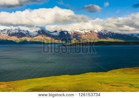 Mighty fjords with mountains covered by snow near Olafsfjordur, Northern Iceland