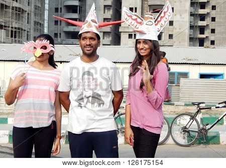 HYDERABAD,INDIA-MARCH 27:Indian young adult wear theatre masks during raahgiri open road event on March 27,2016 in Hyderabad,India