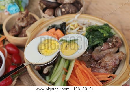 Bibimbap korean food is delicious placed on wood background
** Note: Visible grain at 100%, best at smaller sizes