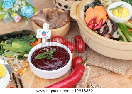 Bibimbap korean food is delicious placed on wood background
