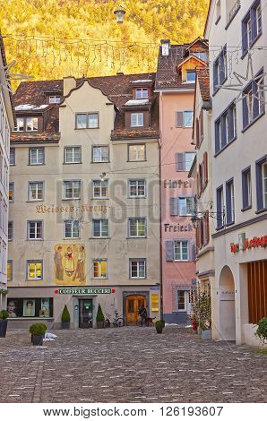 CHUR SWITZERLAND - JANUARY 1 2014: Street view of the Old Town of Chur. Chur is capital of Graubunden in Switzerland. The city is the oldest one in Switzerland