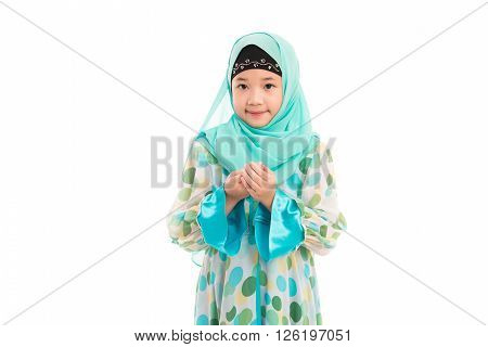 Close up of cute muslim girl on white background isolated.