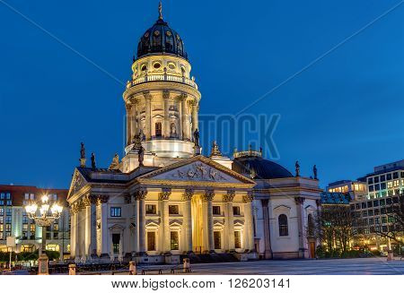 One of the two churches at the Gendarmenmarkt in Berlin at night