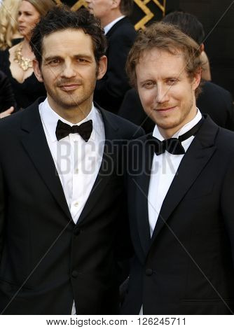 Laszlo Nemes and Geza Rohrig at the 88th Annual Academy Awards held at the Dolby Theatre in Hollywood, USA on February 28, 2016.