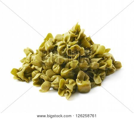 Pile of sacchettoni stuffed sacchetti pasta isolated over the white background