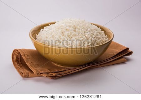 cooked white rice in a bowl, plain basmati rice, cooked basmati rice in ceramic bowl