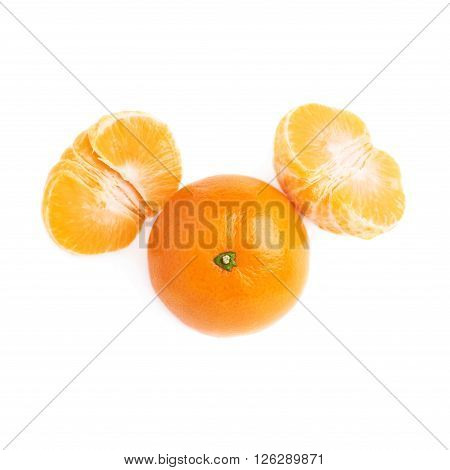 Two halves and fresh juicy tangerine fruit served isolated over the white background