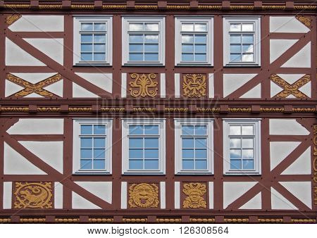NEU ANSPACH, GERMANY - APRIL 18, 2016: old half timbered house facade with ornaments