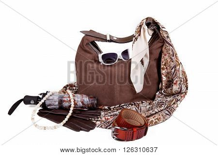 Set of brown autumn women's accessories handbags, sunglasses, belt, scarf and umbrella on a white background