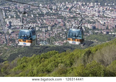 Skopje, Macedonia - April16, 2016: Aerial View Of Cable Car On Vodno Mountain And Background Of Capi