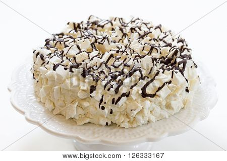 cake with icecream covered with meringue and chocolate