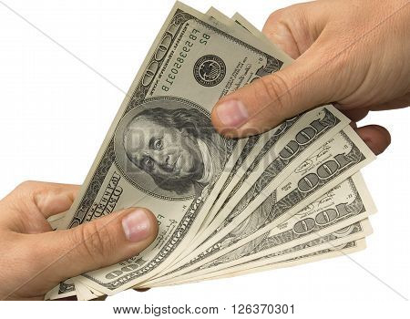 One hand gives money in other hand over white background