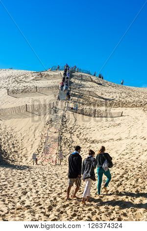 People Visiting The Highest Sand Dune Of Pyla In Europe