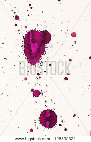 colorful watercolor stains and streaks on a white background