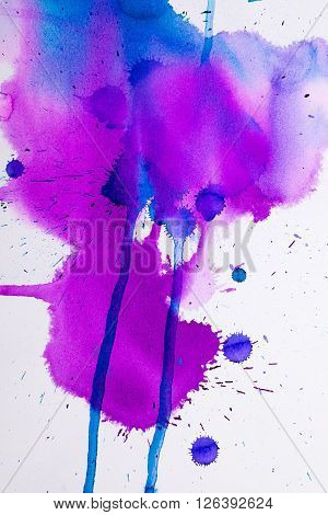 colorful watercolor stains and streaks on a white background