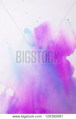 colorful watercolor stains and streaks on a white background