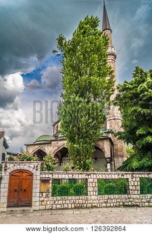 Famous street Bascarsija, viet at mosque, Sarajevo. Old city center.