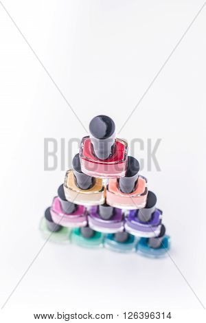 rainbow of nail polish isolated on a white background