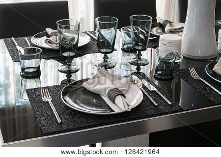 served with a plate on black table in modern dinning room