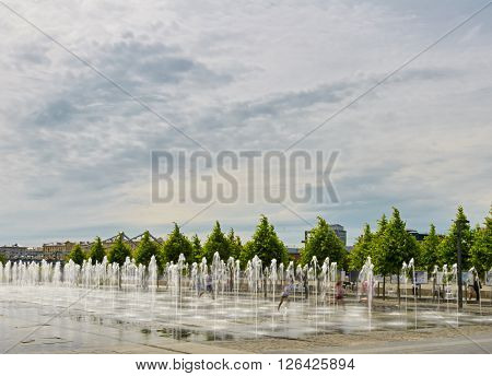 fountain about Pedestrian park Muzeon Arts. Moskow. Russia. people running in move