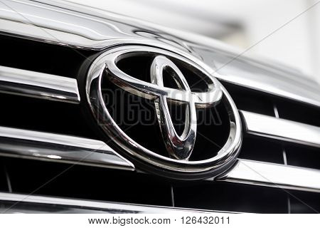 BANGKOK, THAILAND - APRIL 4, 2016 : Closeup of Toyota logo on Toyota fortuner 2014 model in garage.