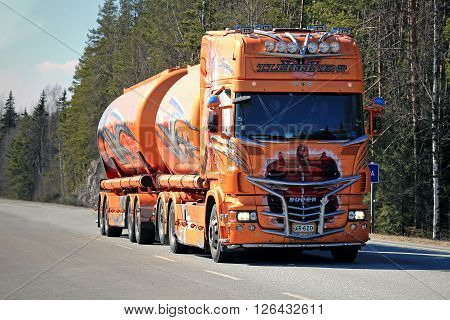 FORSSA, FINLAND - APRIL 16, 2016: Super tank truck Shogun Scania R620 on the road in Forssa. The multiple Nordic Trophy truck show winner by Kuljetus Auvinen is currently owned by Terho Lehtinen Oy.