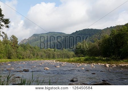 Summer view on a river in russian mountains