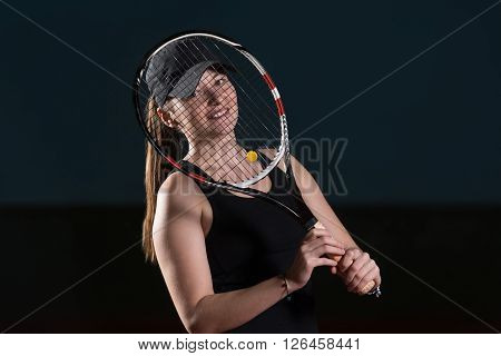 Young Attractive Woman Playing Tennis