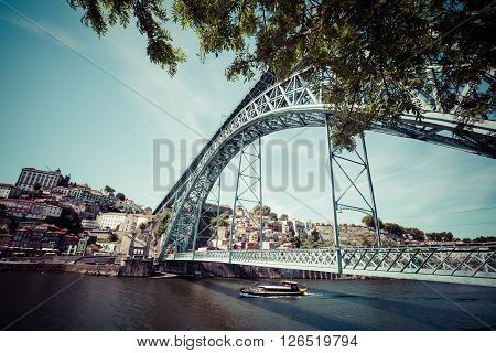 City of Porto in Portugal. Ponte Luiz I Bridge over Douro river and historic architecture of the Old Town.