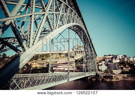 City of Porto in Portugal. Ponte Luiz I Bridge over Douro river and historic architecture of the Old Town.