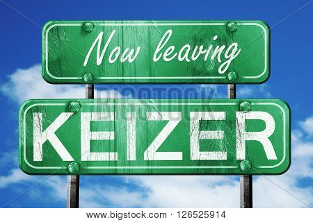 Now leaving keizer road sign with blue sky