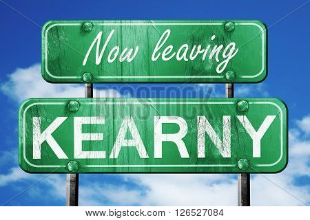Now leaving kearny road sign with blue sky