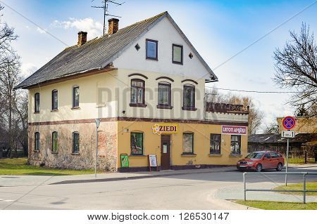 BAUSKA, LATVIA - APRIL 2, 2016: Traditional old private Latvian house in Bauska town