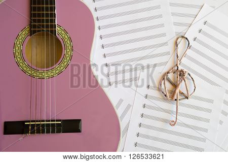 Violet guitar for children with treble clef