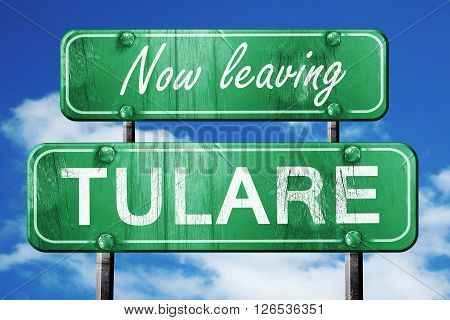 Now leaving tulare road sign with blue sky