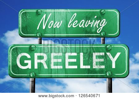 Now leaving greeley road sign with blue sky