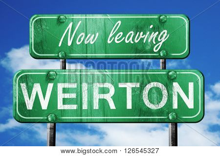 Now leaving weirton road sign with blue sky