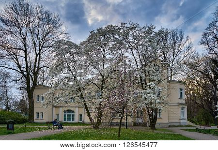 Warsaw, Poland - April 14, 2016: The library building Library for Children and Youth in Veterans Park at spring, Stare Wlochy