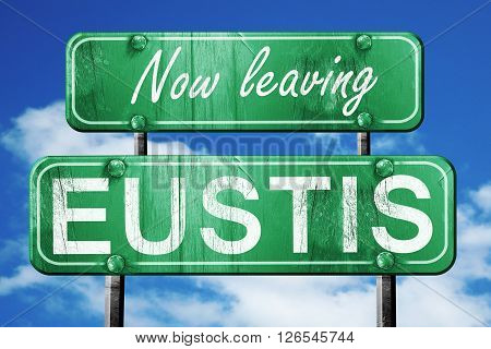 Now leaving eustis road sign with blue sky