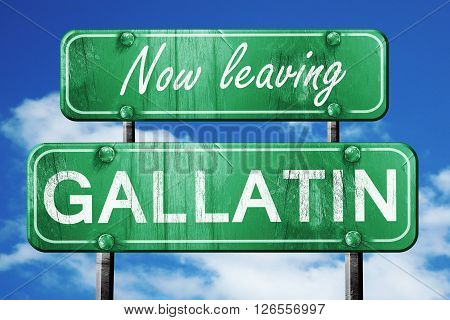 Now leaving gallatin road sign with blue sky