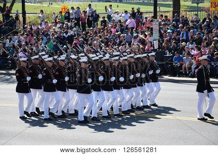 WASHINGTON, DC - APR 16: Marching at the 2016 National Cherry Blossom Parade in Washington DC, as seen on April 16, 2016. Thousands of visitors gathered to attend this annual event.