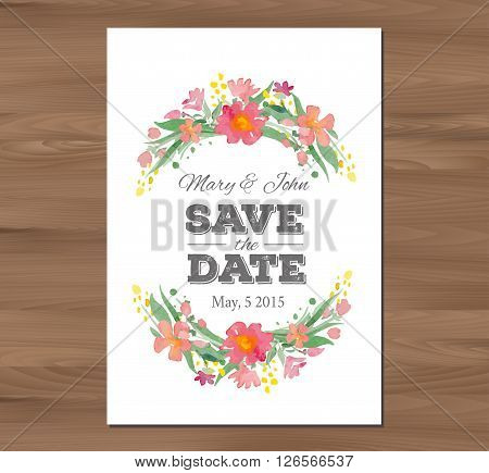 Save the date wedding invitation with watercolor flowers and typographic elements. Card template on a wooden background. Free fonts used - Nexa Rust, Alex Brush, Crimson