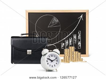 Business objects isolated on white. Chalkboard with finance graph and couns , briefcse, alarm clock