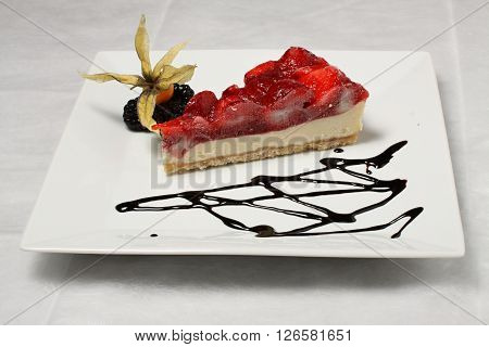 Single piece of strawberry cake with chocolade