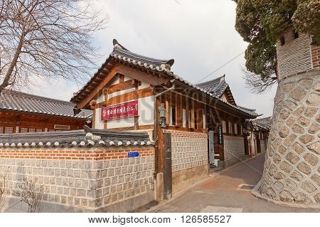 SEOUL, SOUTH KOREA - MARCH 14, 2016: Han Sang Soo Embroidery Workshop of Folk Bukchon Hanok Village in Seoul Korea. Hanok is a traditional Korean house.