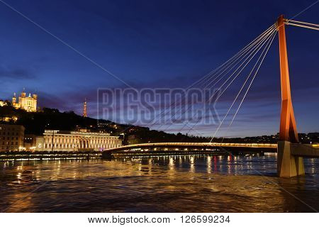 LYON FRANCE -  April 19 2016 : Blue hour on Saone river and the Historic districts of Lyon designated a UNESCO World Heritage Site in 1998.