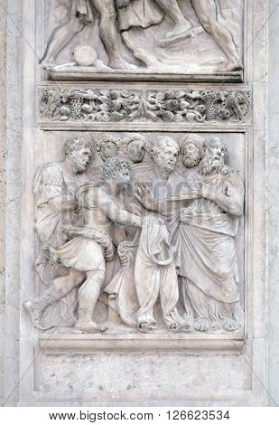 BOLOGNA, ITALY - JUNE 04: The brothers show Joseph's clothes to Jacob, panel by Girolamo da Trevisio on the right door of San Petronio Basilica in Bologna, Italy, on June 04, 2015