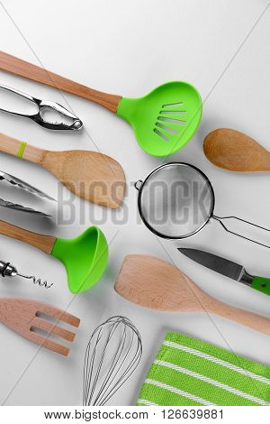 Set of stainless and wooden utensils, isolated on white